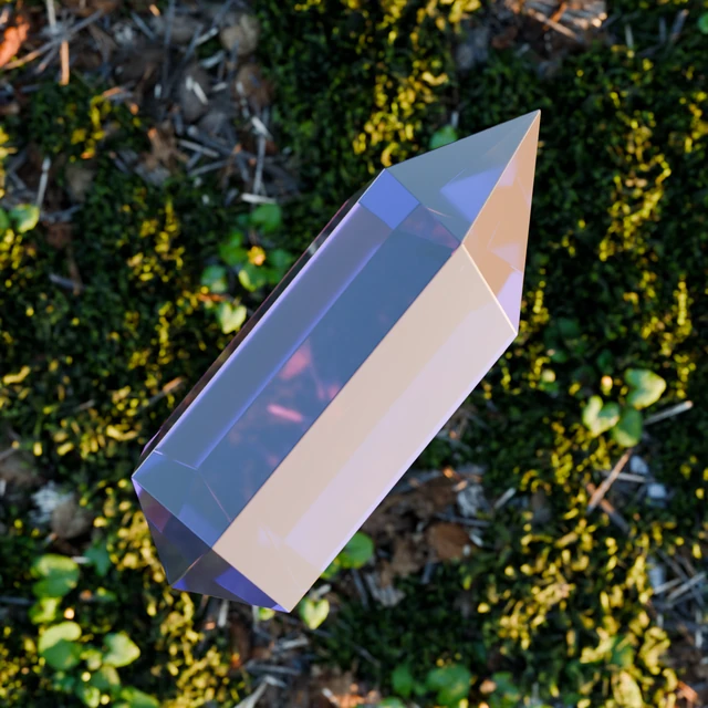 Included faceted crystal with a pointed tip